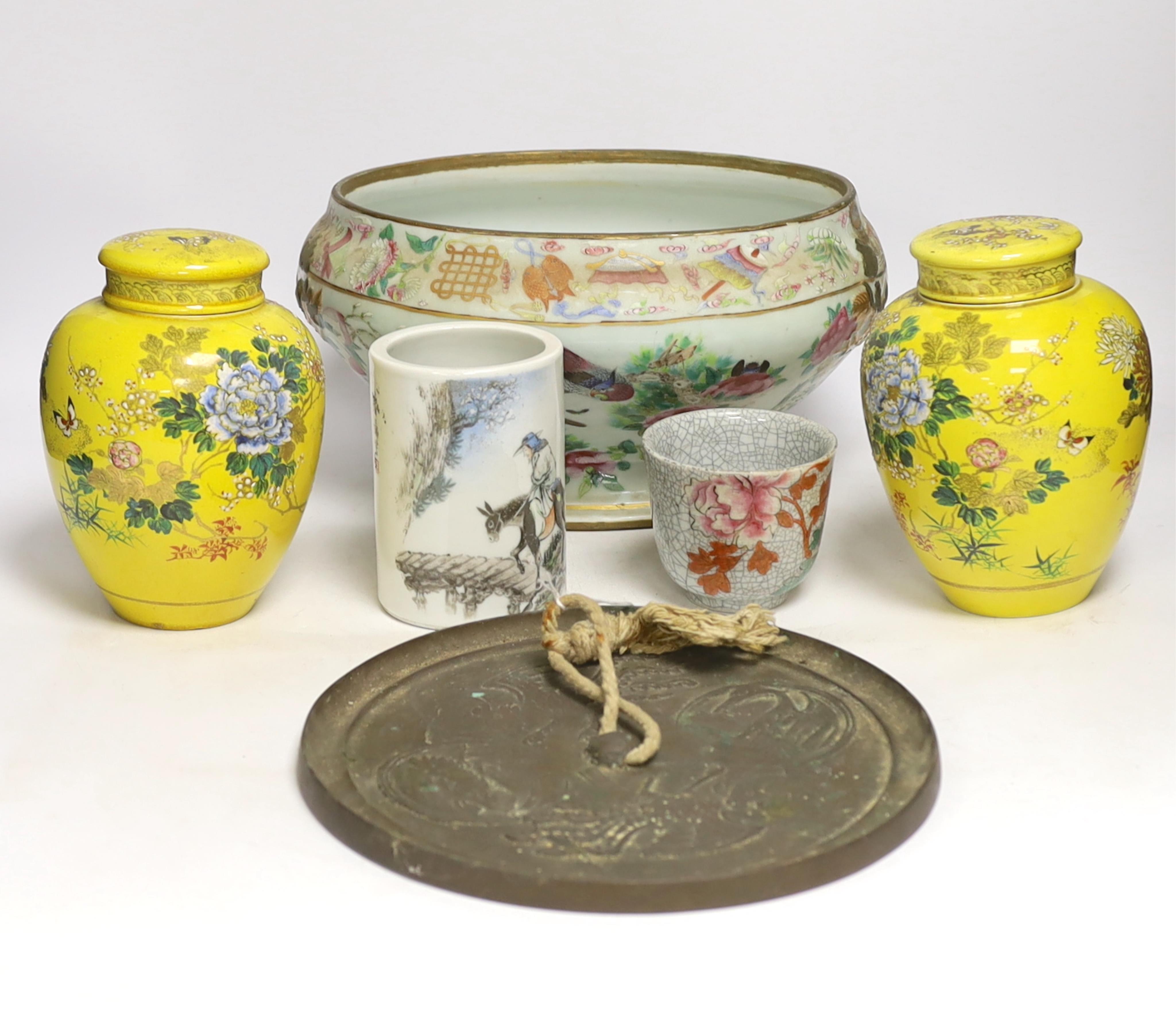 A 19th century Chinese famille rose tureen (lacking cover), a bronze mirror, a brush pot, a crackle glazed teabowl and a pair of Japanese yellow glazed satsuma jars and covers, tallest 18cm (6)